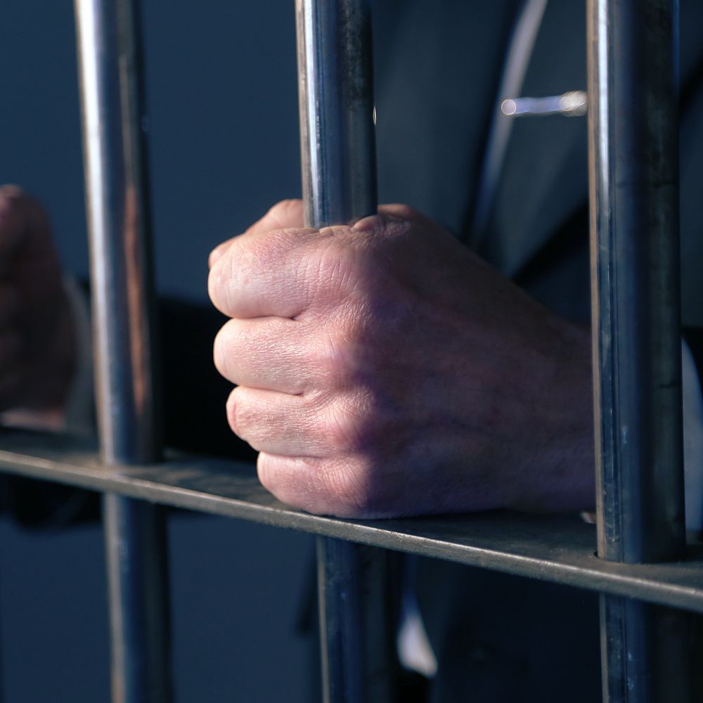 person behind bars